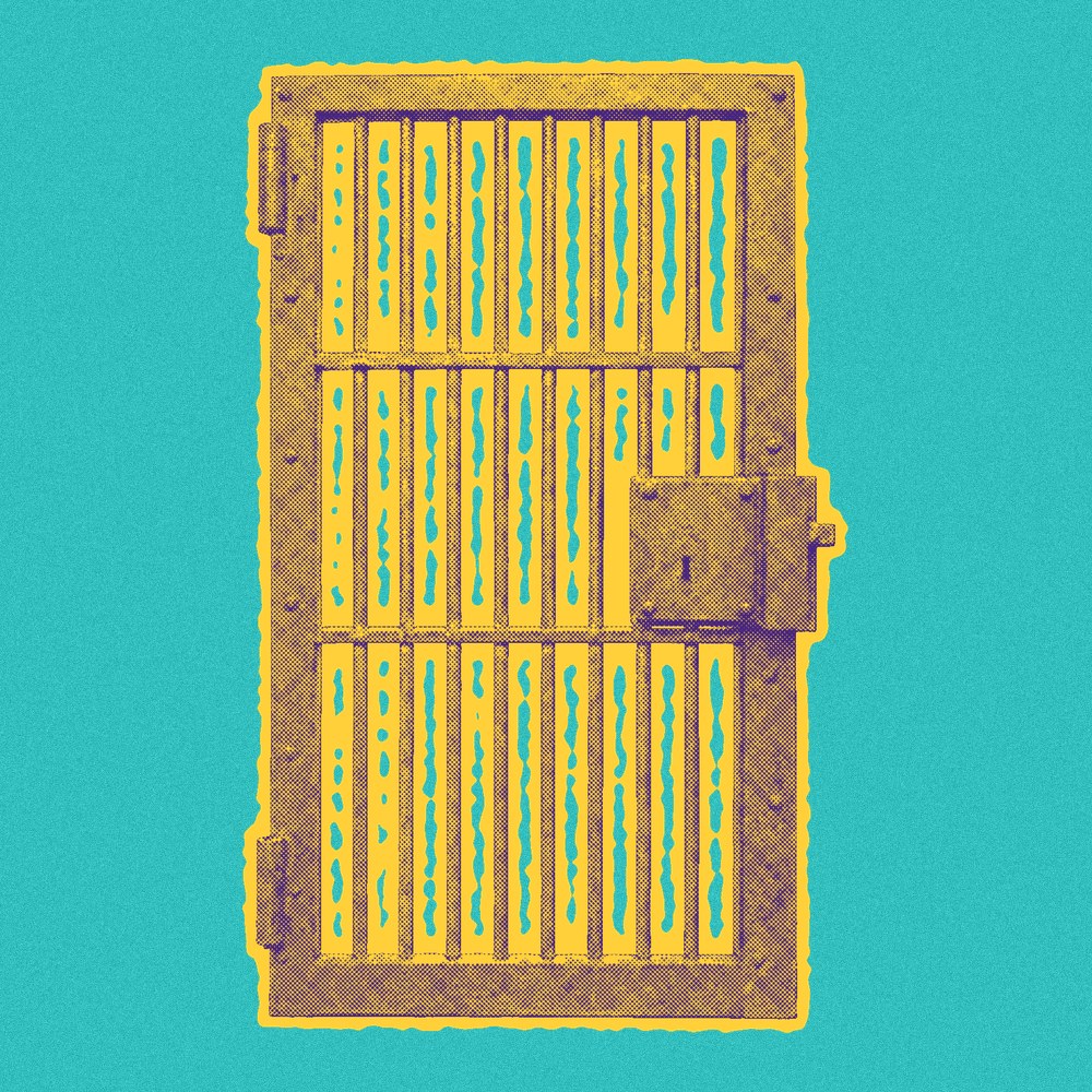 Newsprint cut-out of a jail cell door.